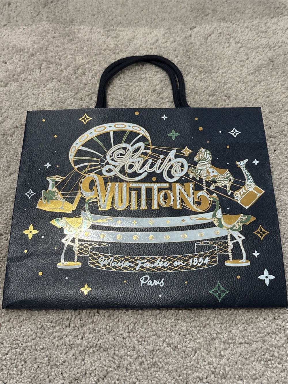 Louis Vuitton Black Bag with Gold and White Carousel Motif